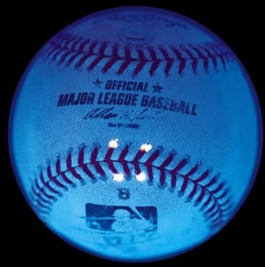 The black light marks on Barry Bonds' 600th home run ball auctioned by Legendary Auctions.  Major League Baseball placed the marks on the balls used during his at bats.