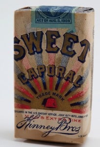 Sweet Caporal cigarette packs with a 1909 tax stamp.