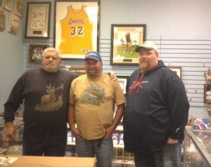 Warren Wolk (center) with a couple of loyal customers.