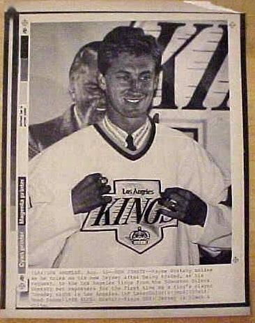 Laserphoto of Wayne Gretzky signing with the Los Angeles Kings. Laserphotos closely resemble wirephotos.