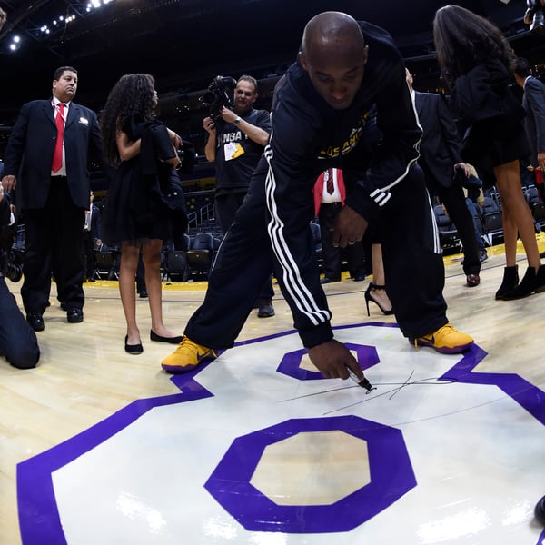 Kobe Bryant last game autographing court panel 8